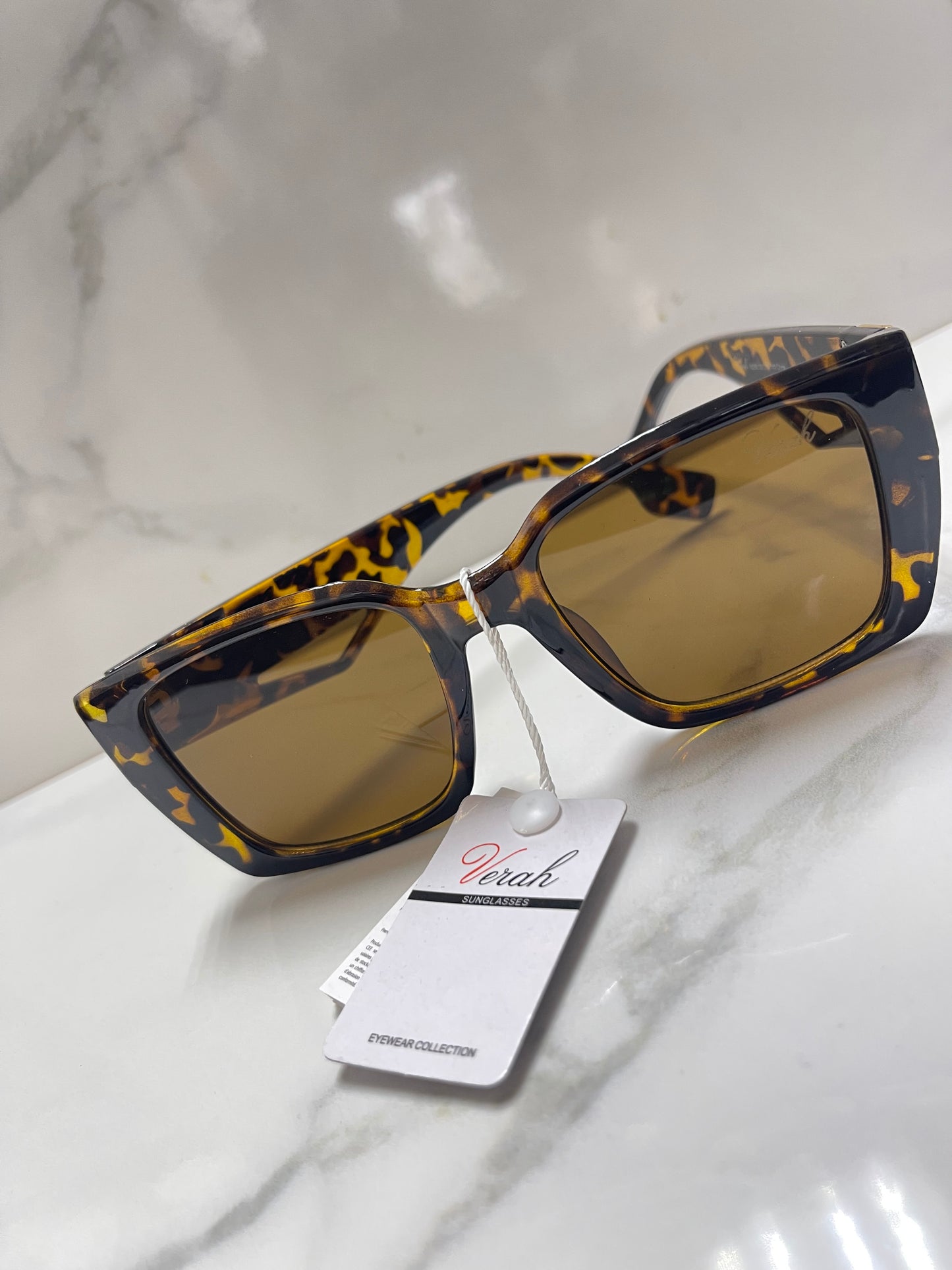 Sunglasses  Excellent quality and price shipped fast