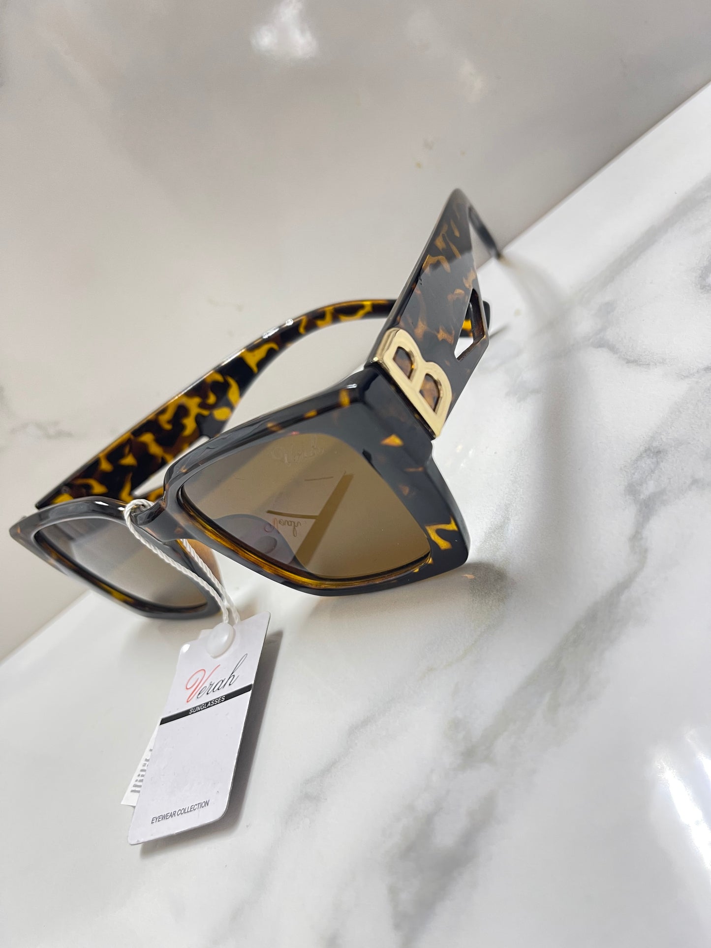 Sunglasses  Excellent quality and price shipped fast